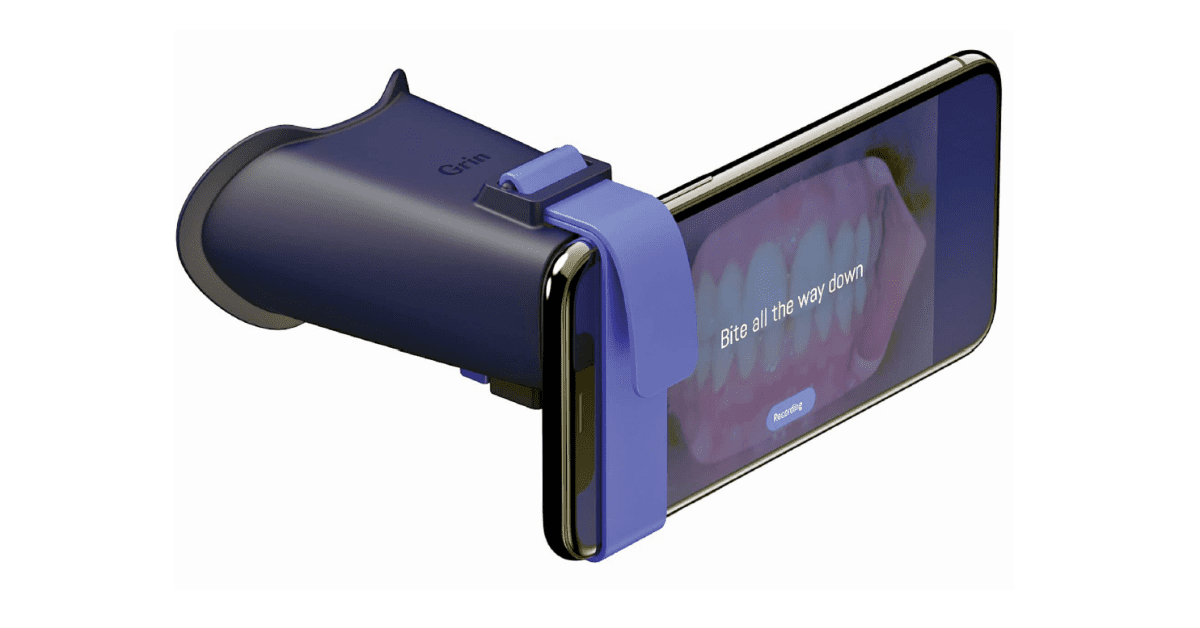 Dental imaging device attached to a smartphone, displaying teeth with the words "Bite all the way down." It conveys medical and tech precision.
